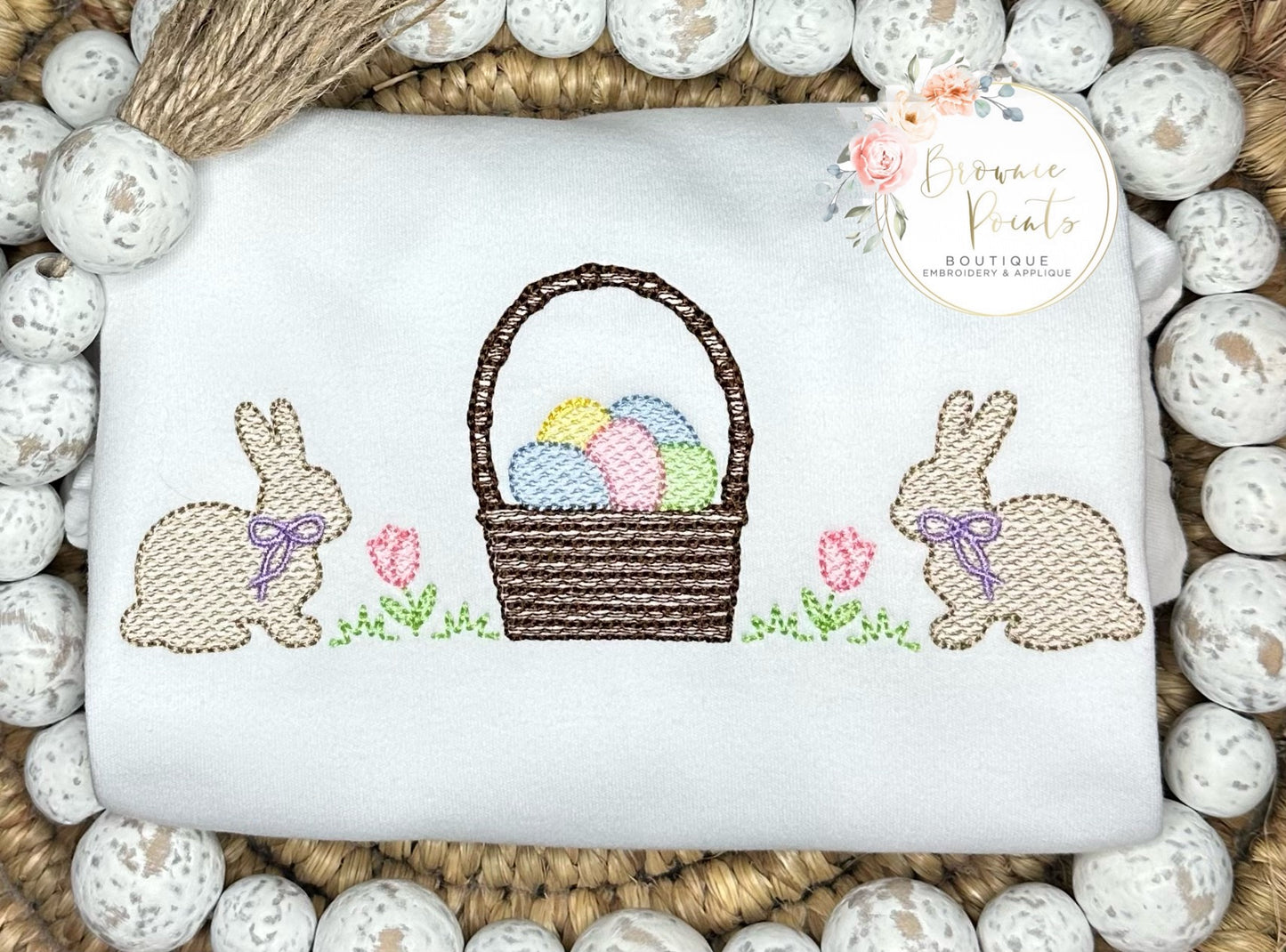Easter bunnies with basket and eggs