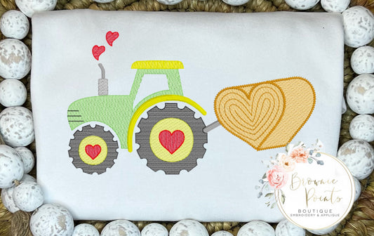 Valentine tractor with haybale-green