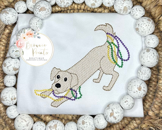 Mardi Gras puppy with beads