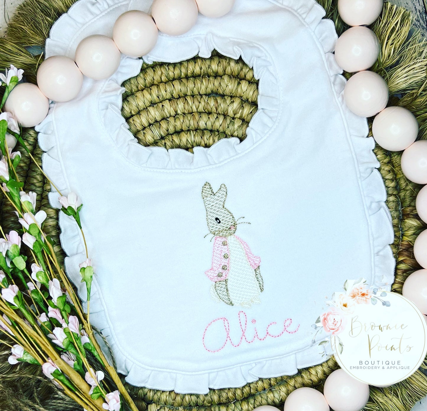 Peter Rabbit ruffle bib pink embroidery